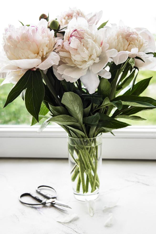 Beautiful pink peony bouquet in a vase photo