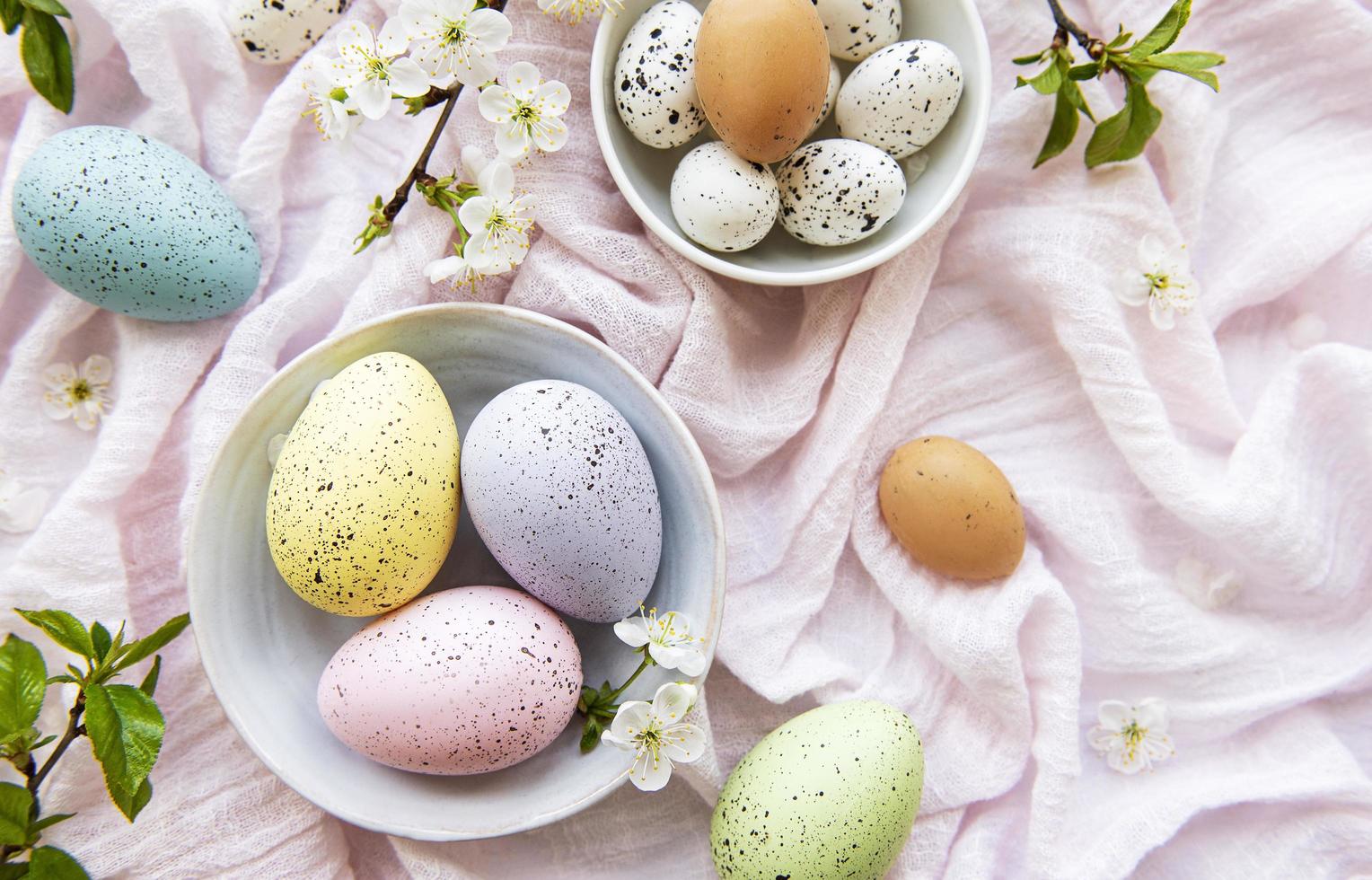 Colorful Easter eggs with spring blossom flowers photo