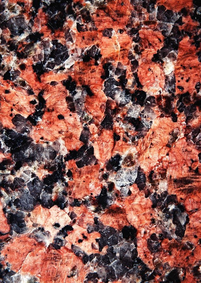 Red and black mottled stone photo