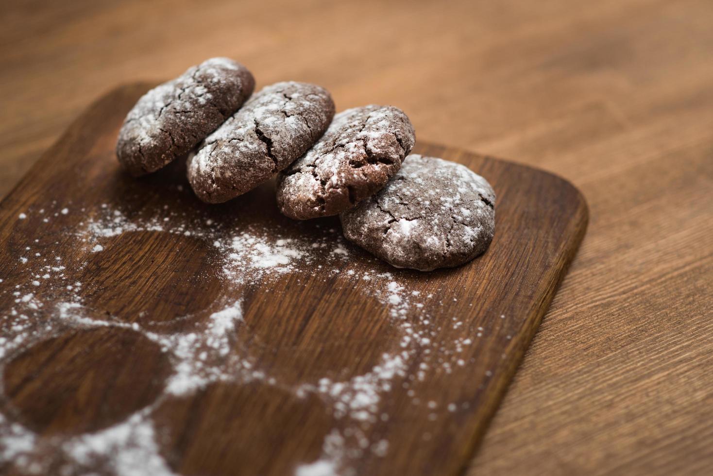 Chocolate cookies on the wood board photo