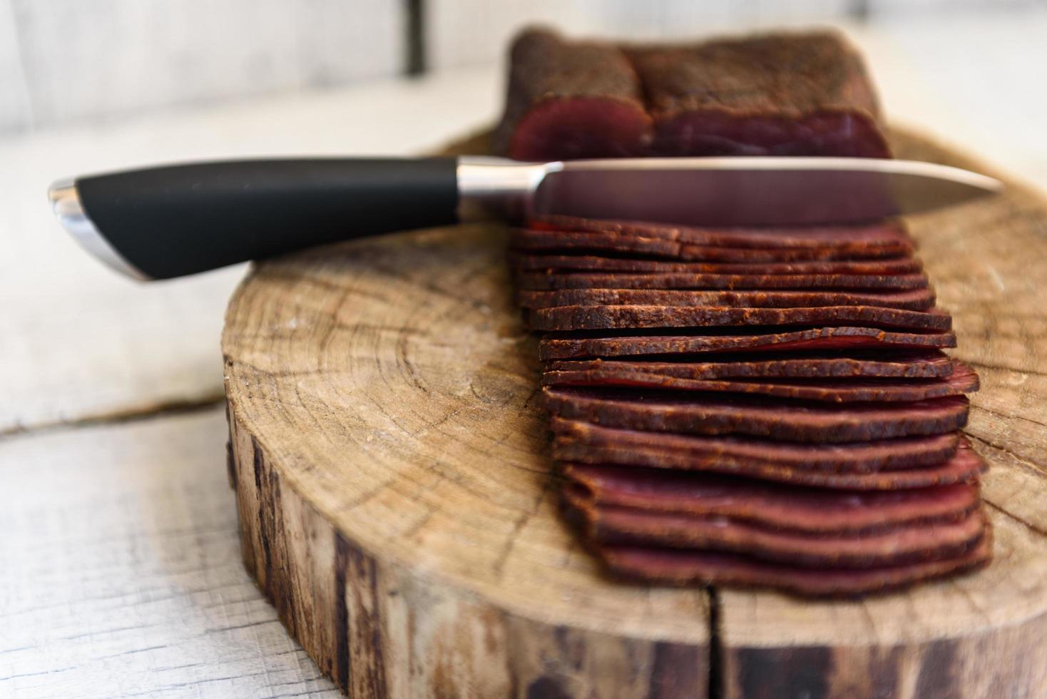 Pastrami on the wood table photo