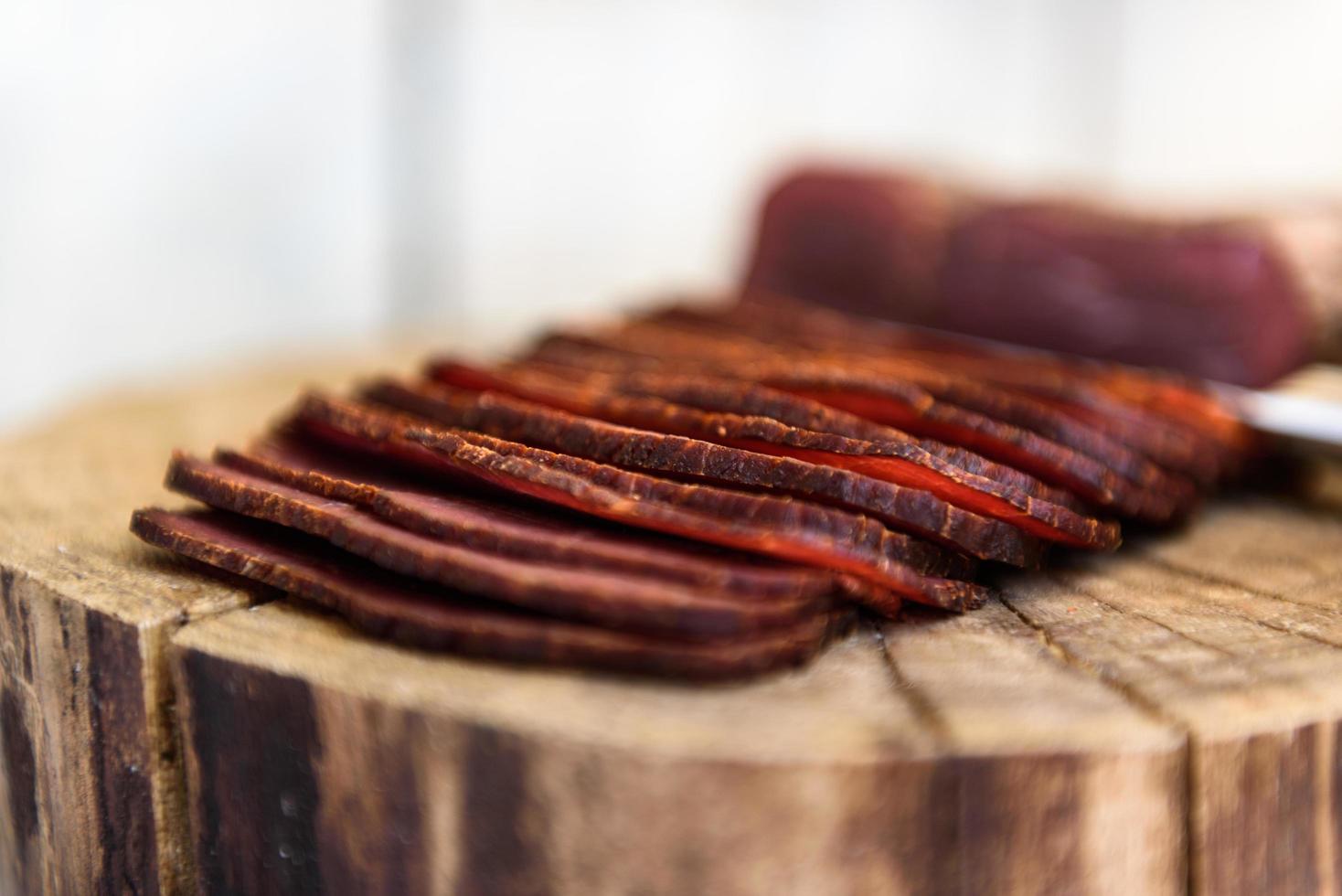 Pastrami on the wood table photo