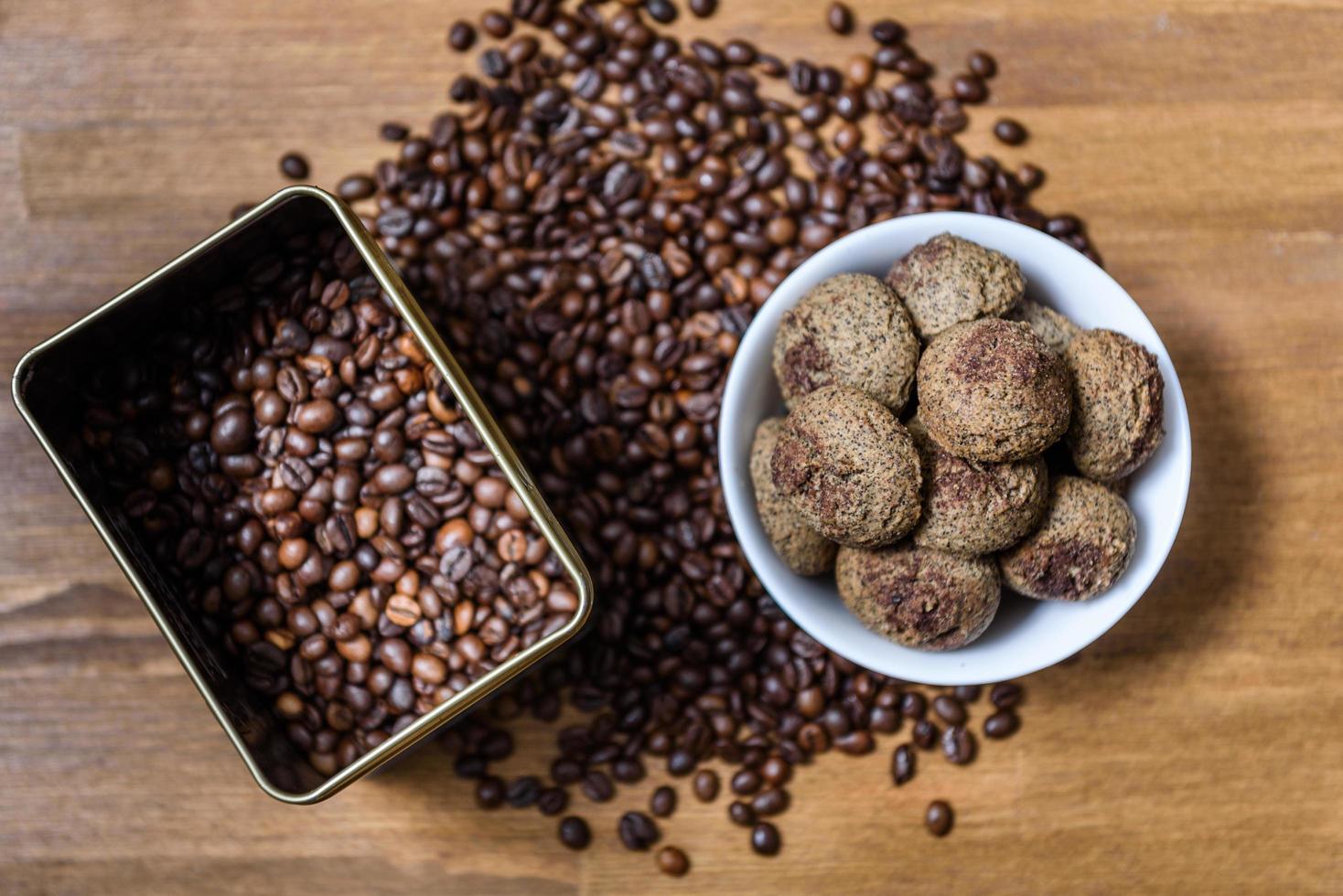 Coffee cookies in a plate with sprinkled coffee beans photo
