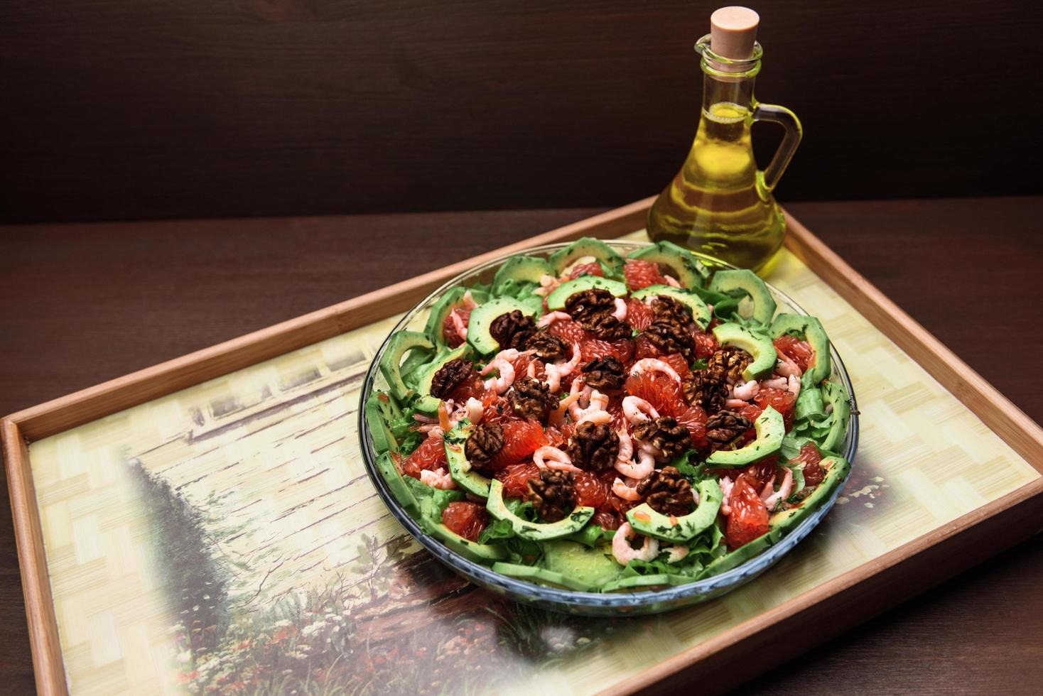 Avocado salad on the plate photo