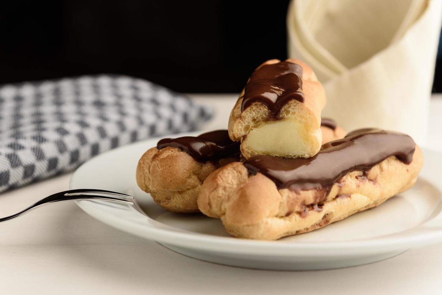 Profiteroles with butter cream photo