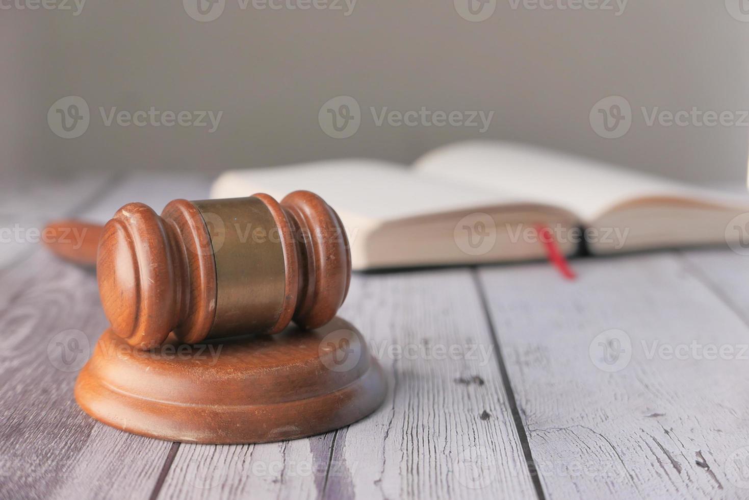 Gavel and book with copy space on table photo