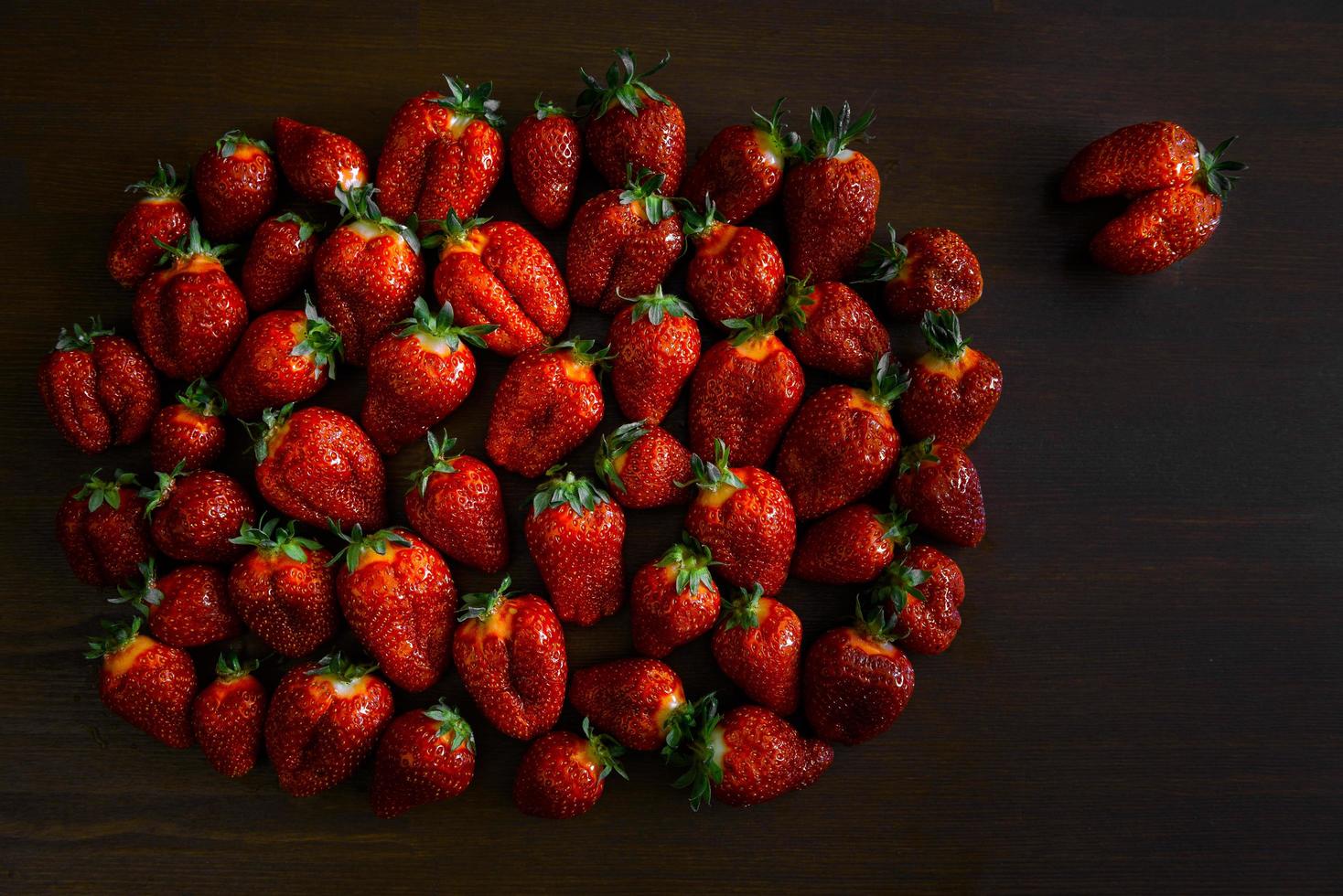 Strawberries on a wooden table photo