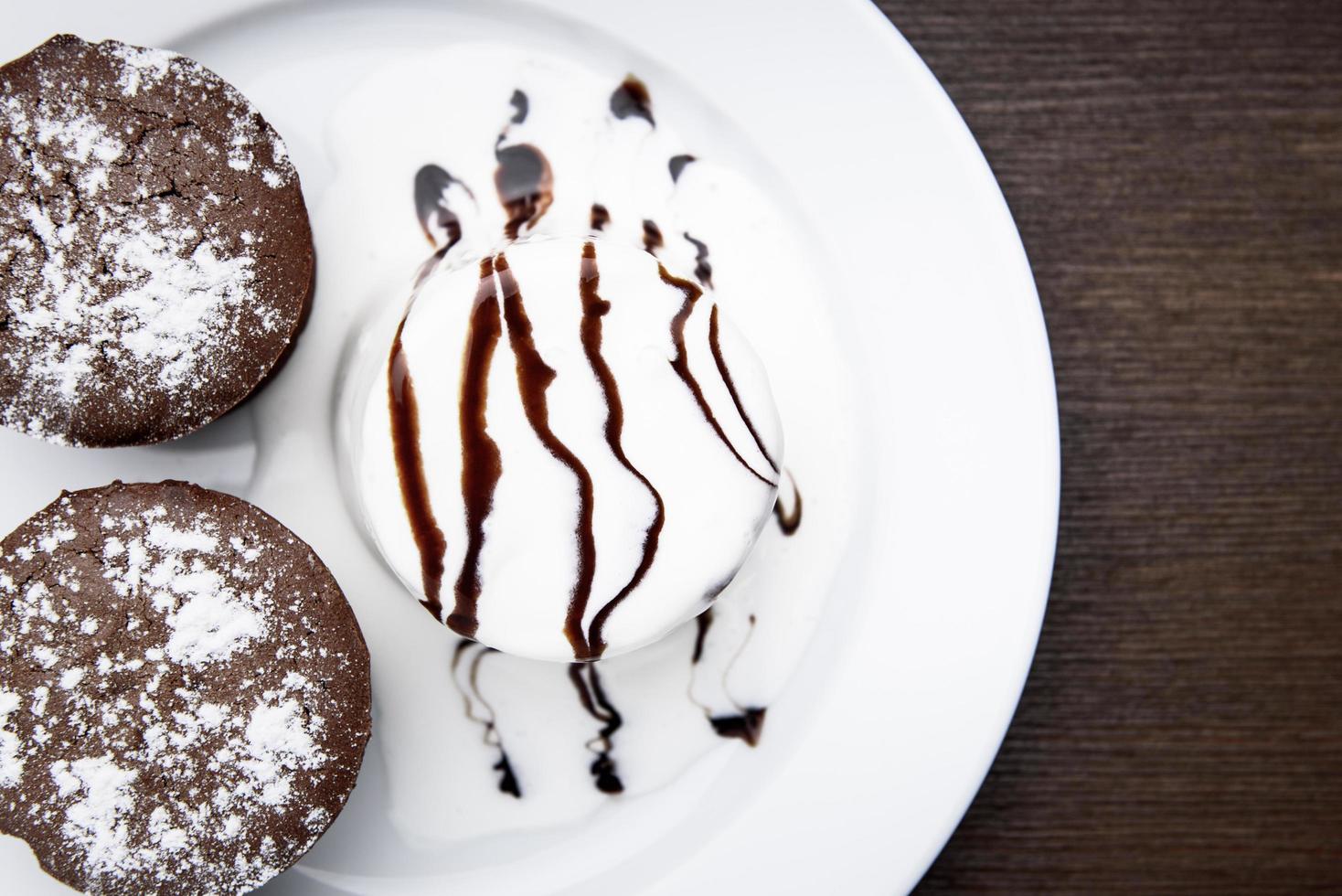 Chocolate muffins with ice cream photo