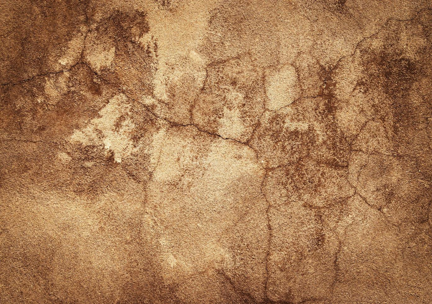 Old ocher plaster with cracks photo