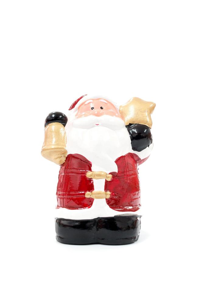 Juguete de figura modelo de santa claus aislado sobre un fondo blanco. foto