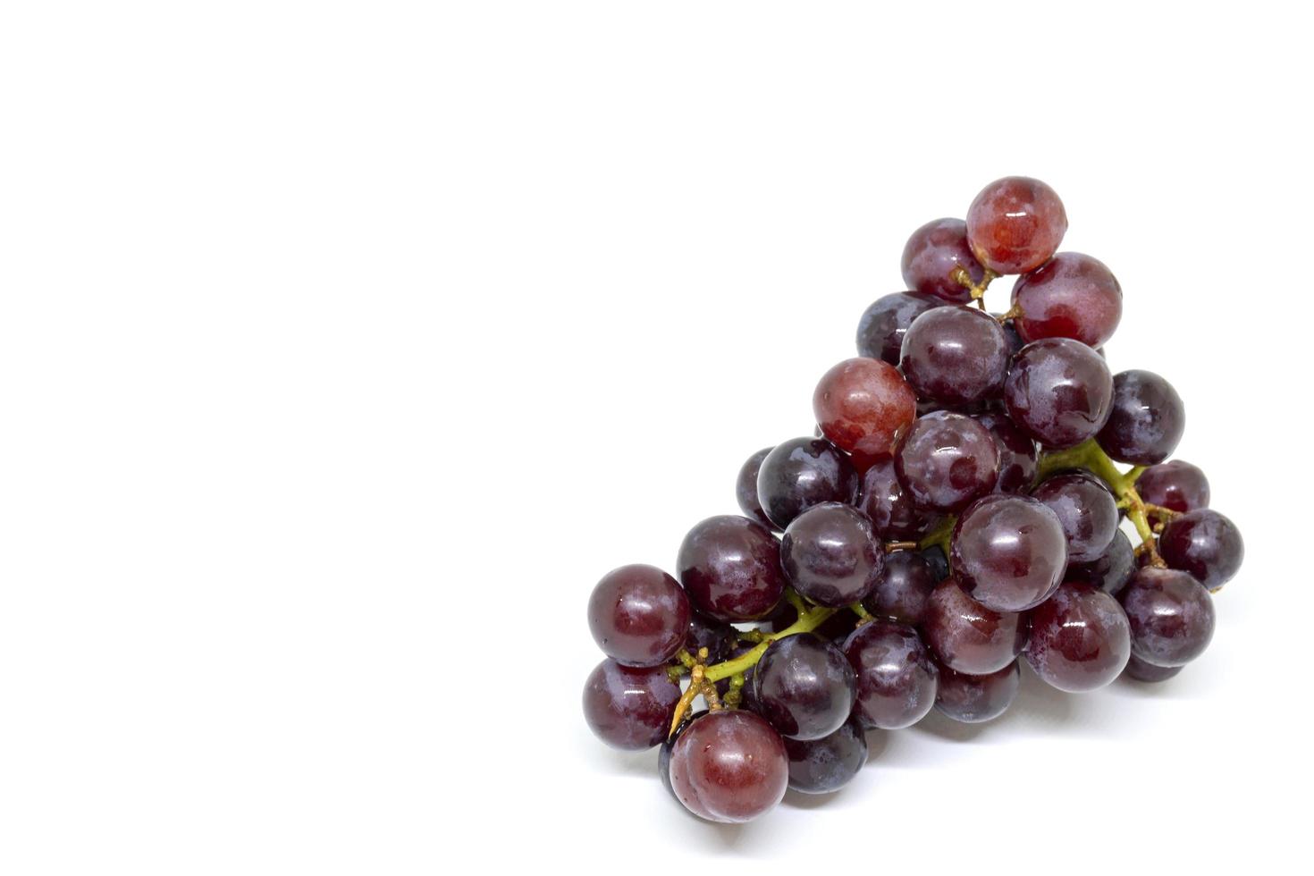 Seedless grapes isolated on a white background photo