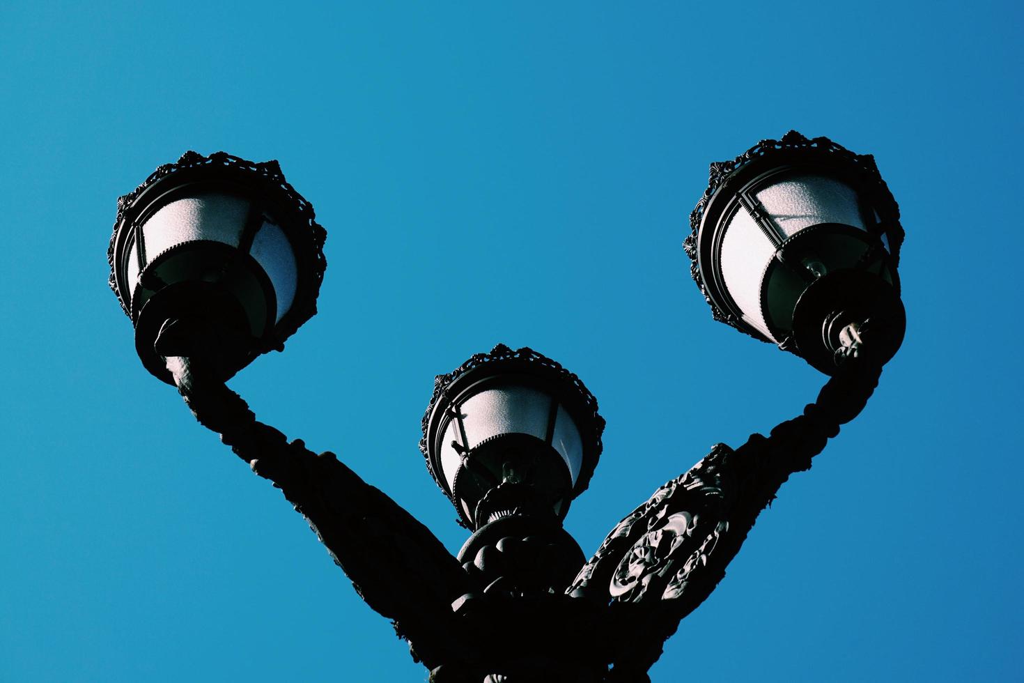 Street lamps in the street in Bilbao city, Spain photo