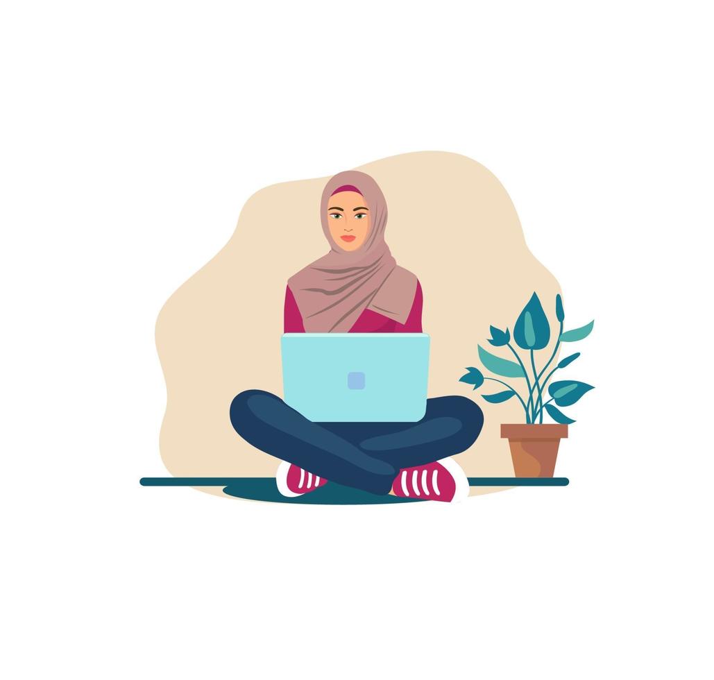 hijab woman sitting on the floor with a laptop vector