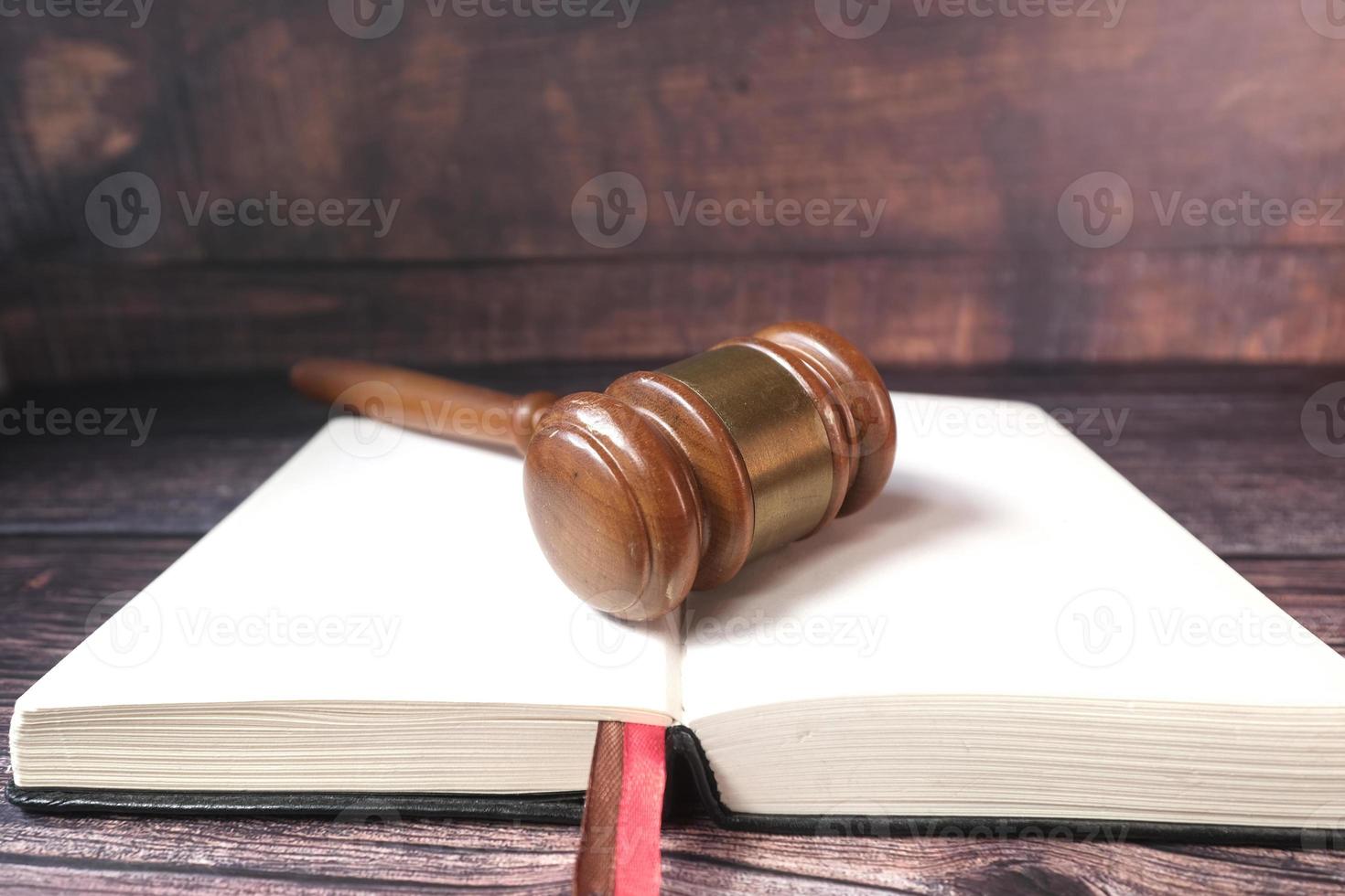 Close up of gavel on a open book photo