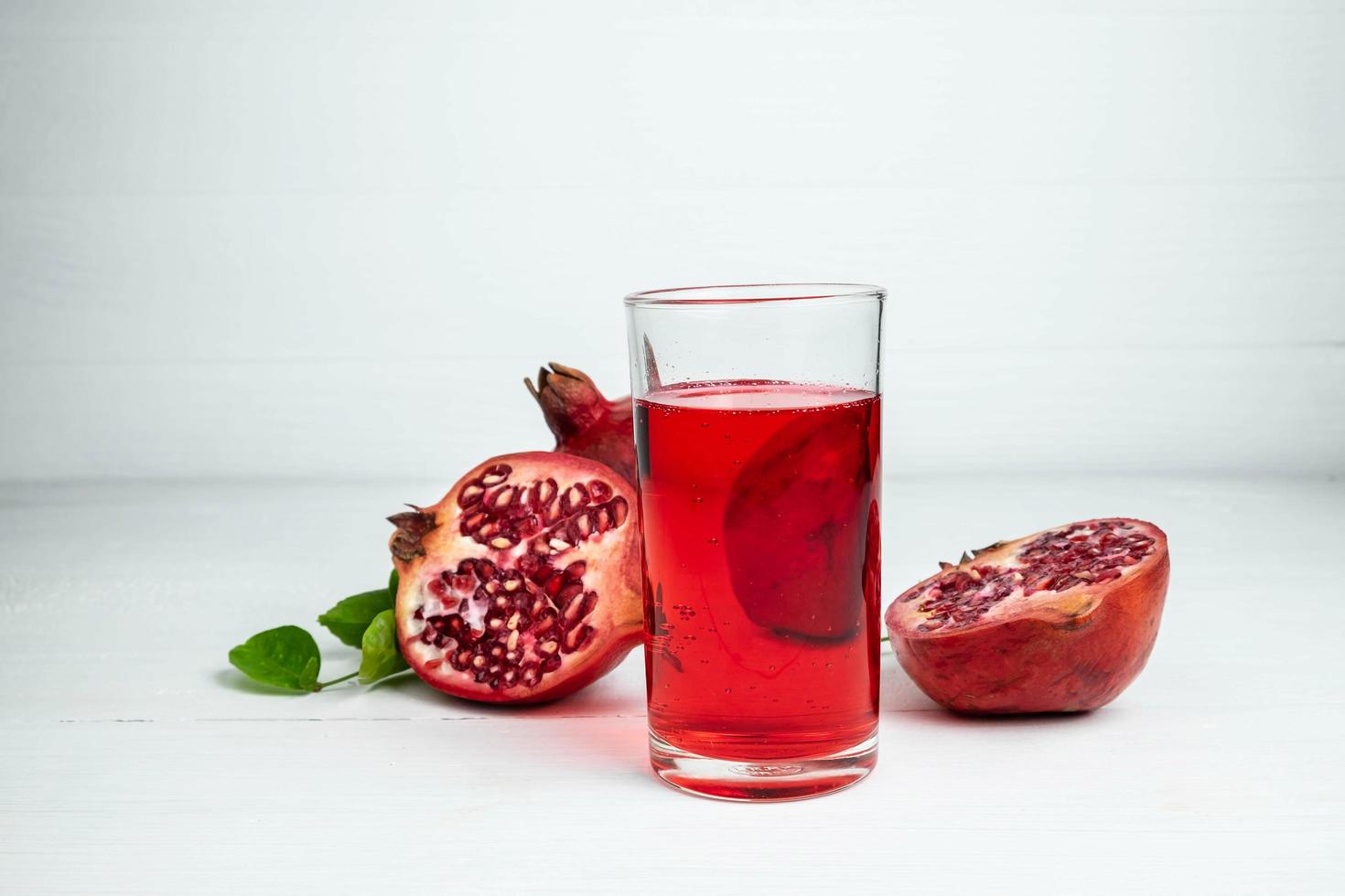 Pomegranate juice in a glass photo