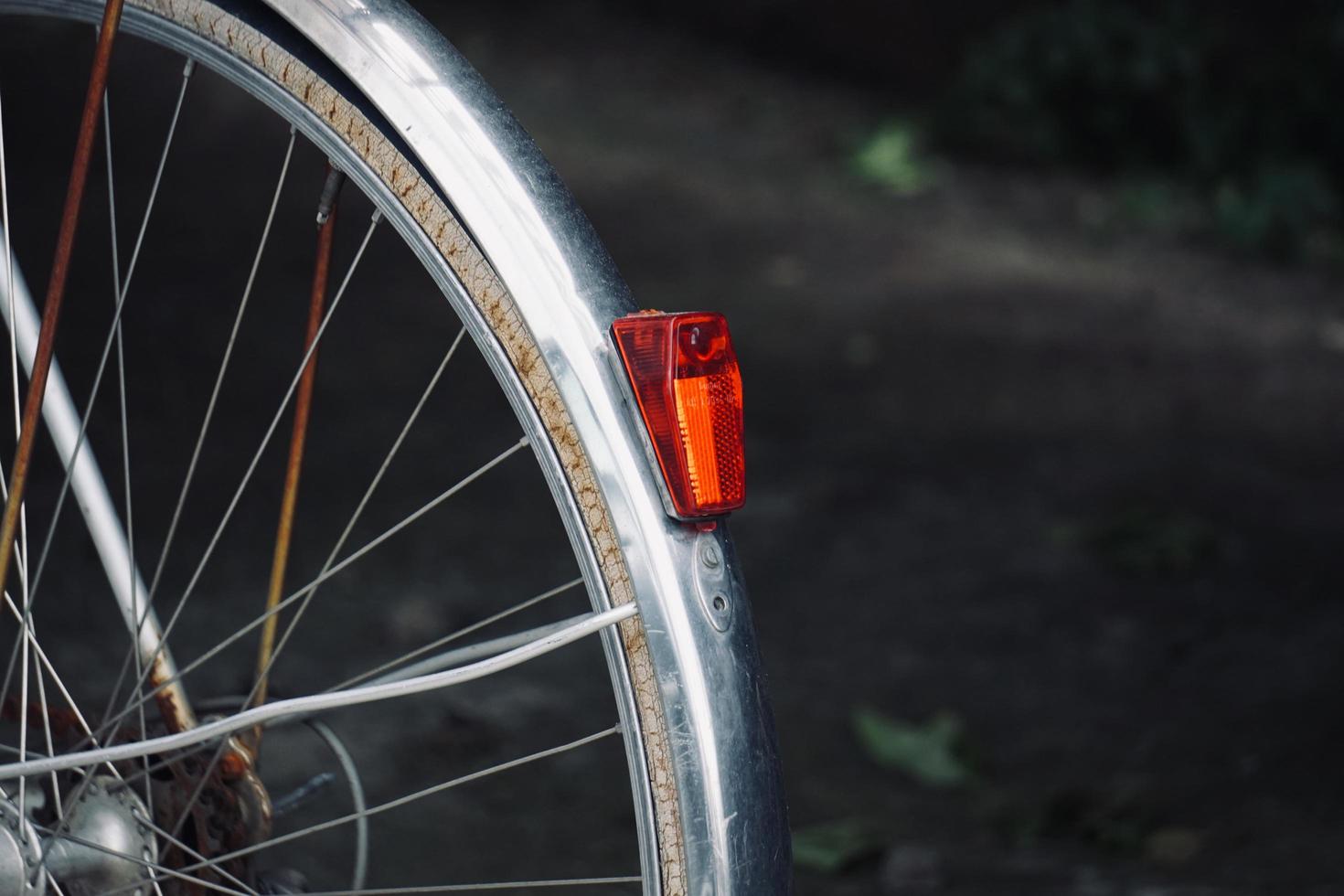 Bicycle wheel on the street photo