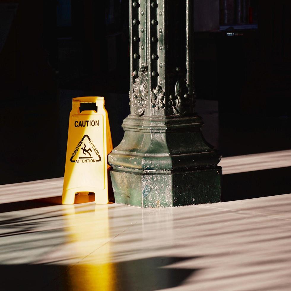 Caution signal on the floor photo