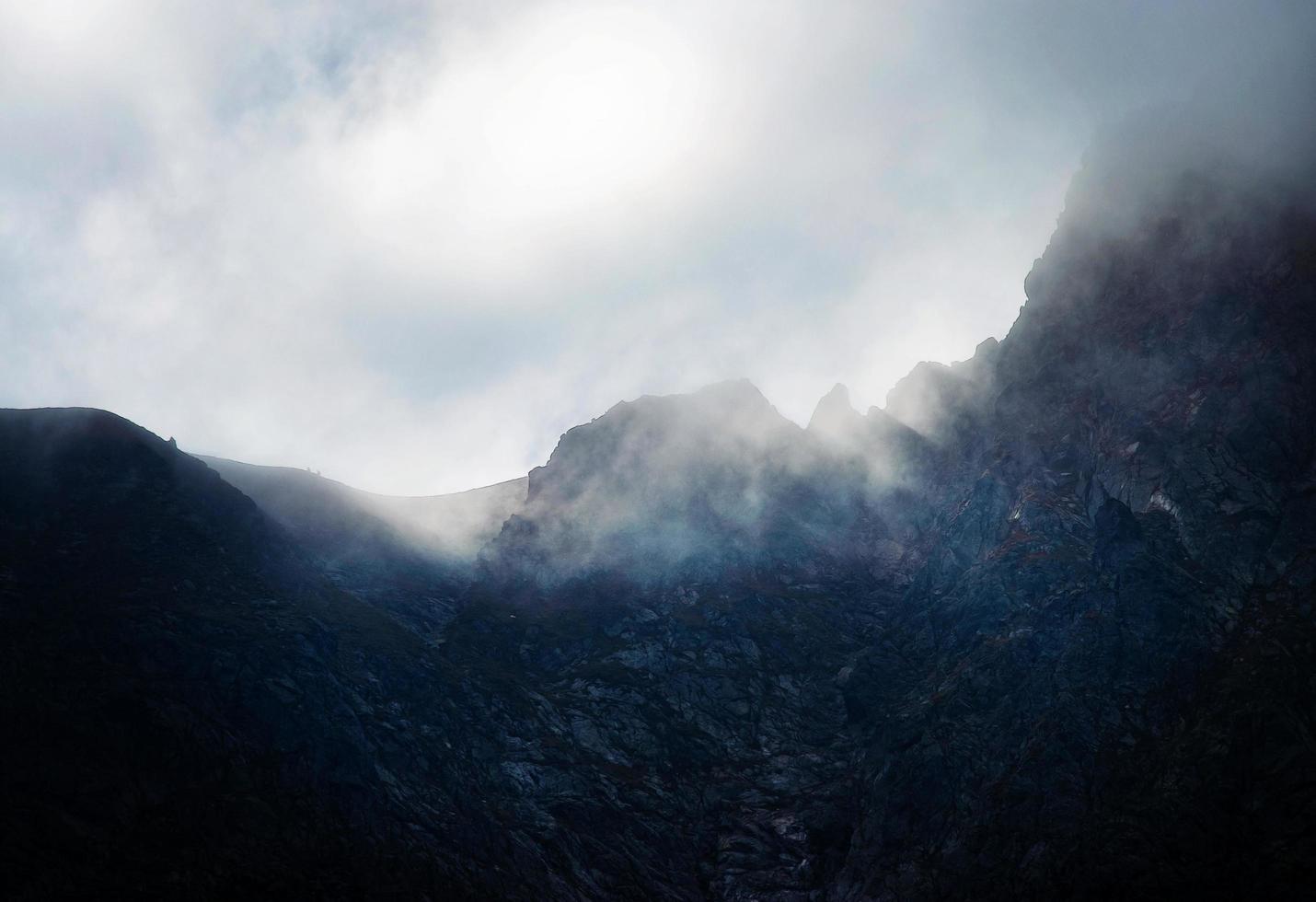 Fog over the mountain saddle photo