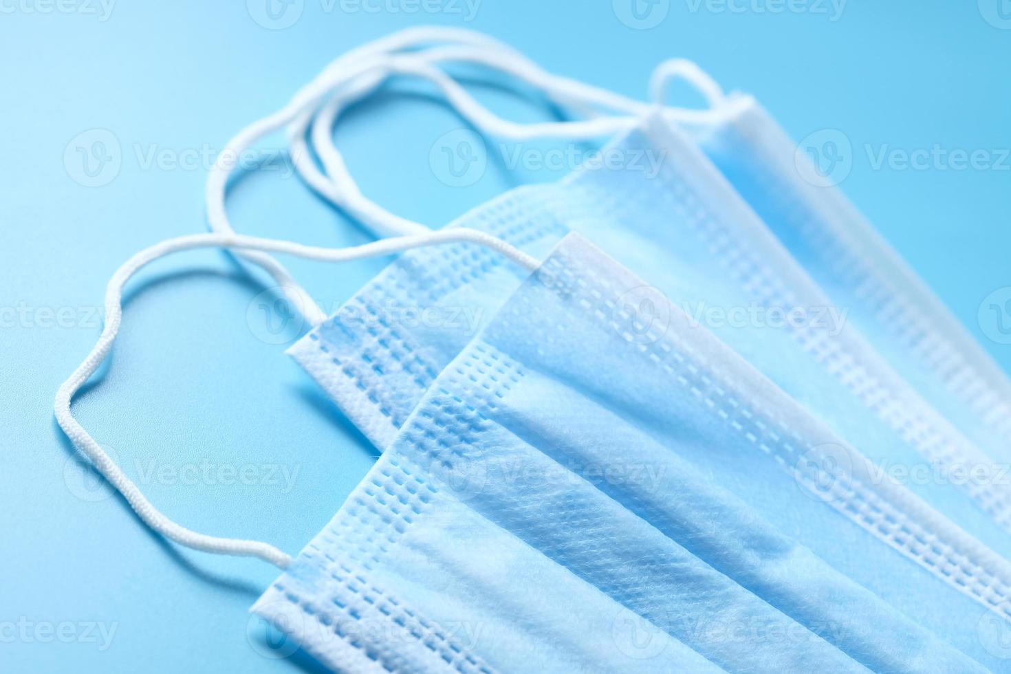 Close up of blue surgical masks photo