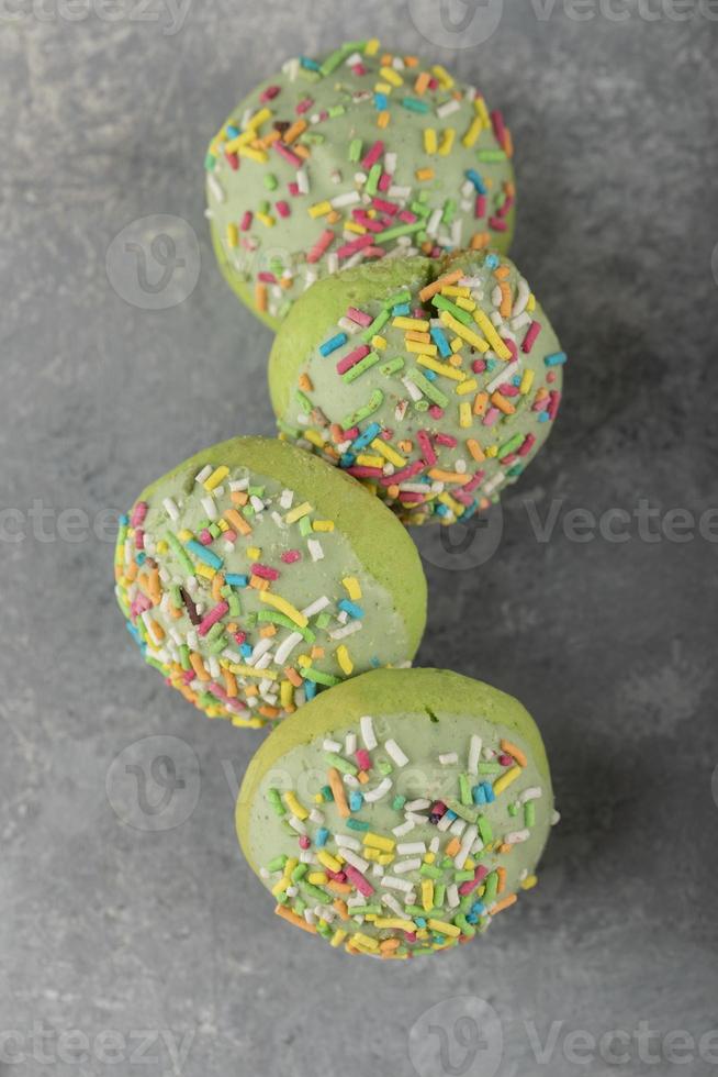 Set of sweet doughnuts with sprinkles photo