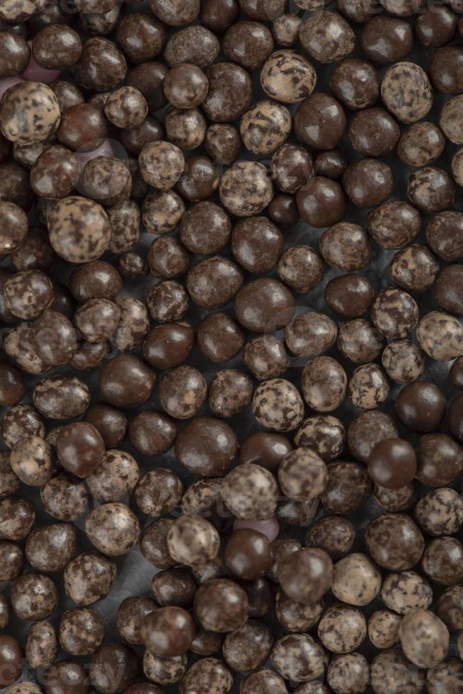 Chocolate round sprinkles macro texture photo
