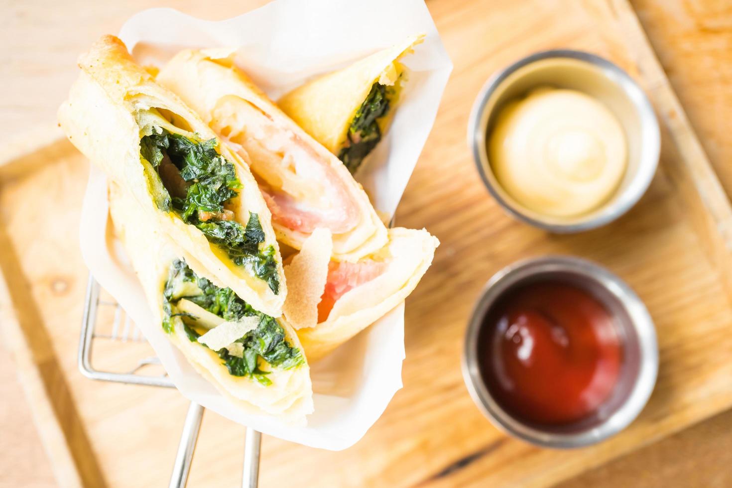 Fried spring roll with ham cheese and spinach vegetable photo