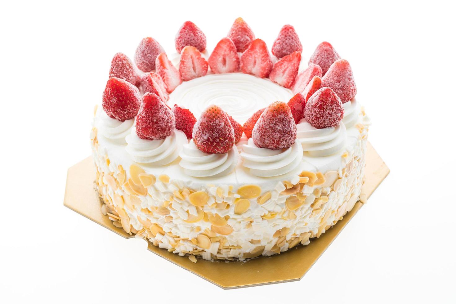 Vanilla ice cream cake with strawberry on top photo