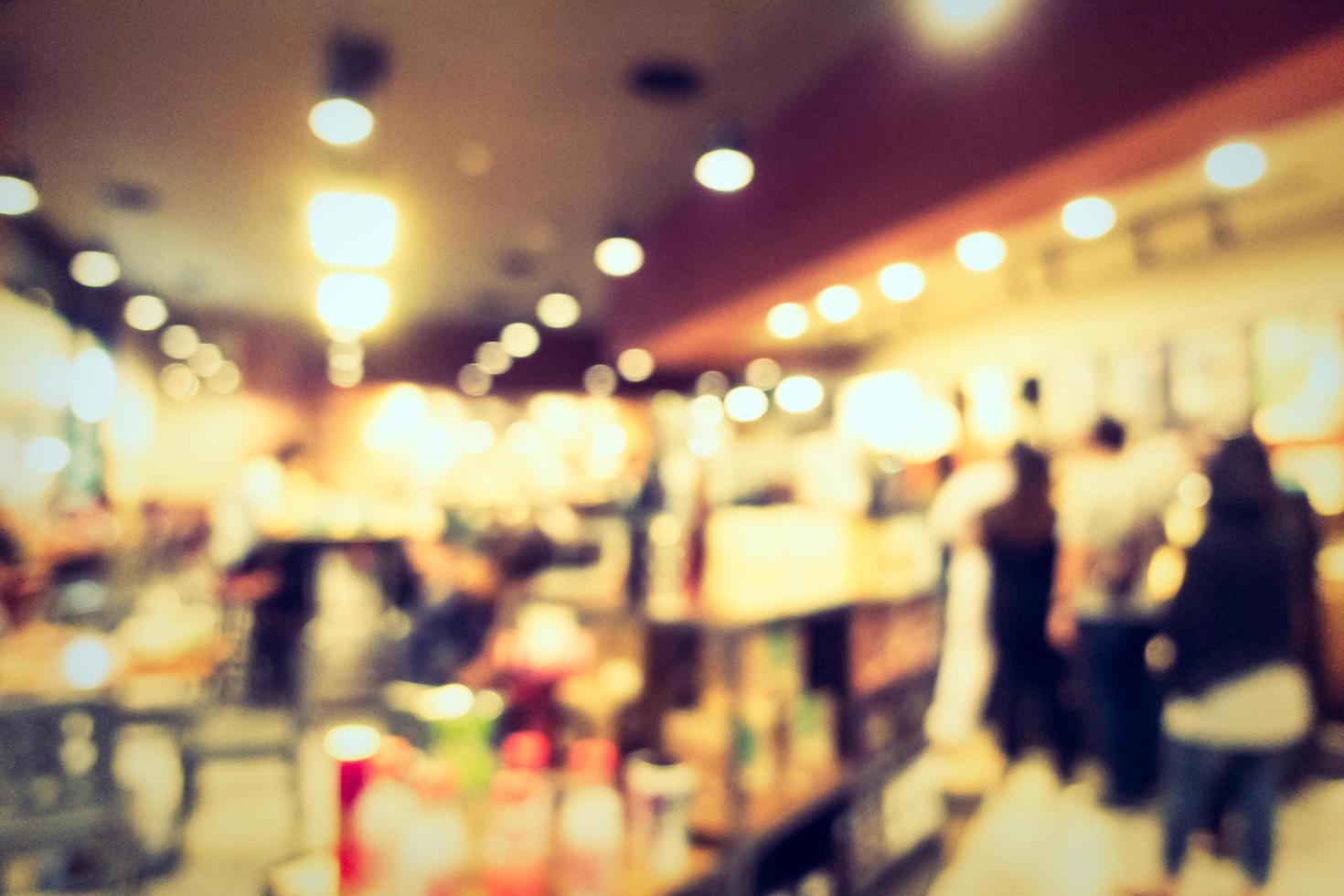 Abstract defocused coffee shop interior for background photo