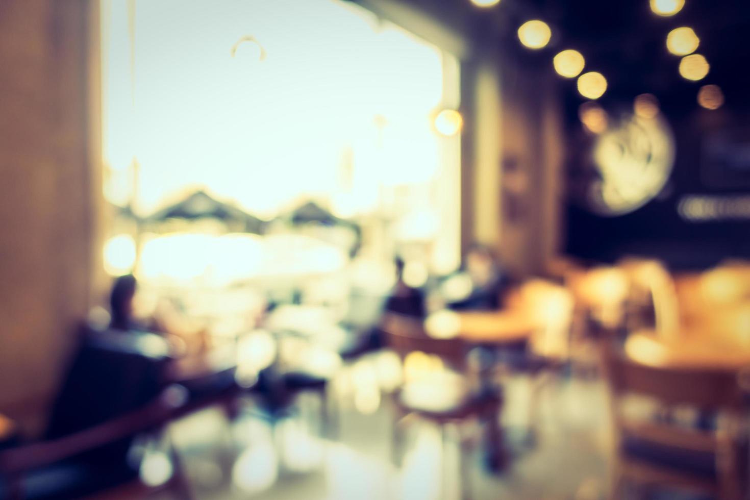 Abstract defocused coffee shop interior for background photo