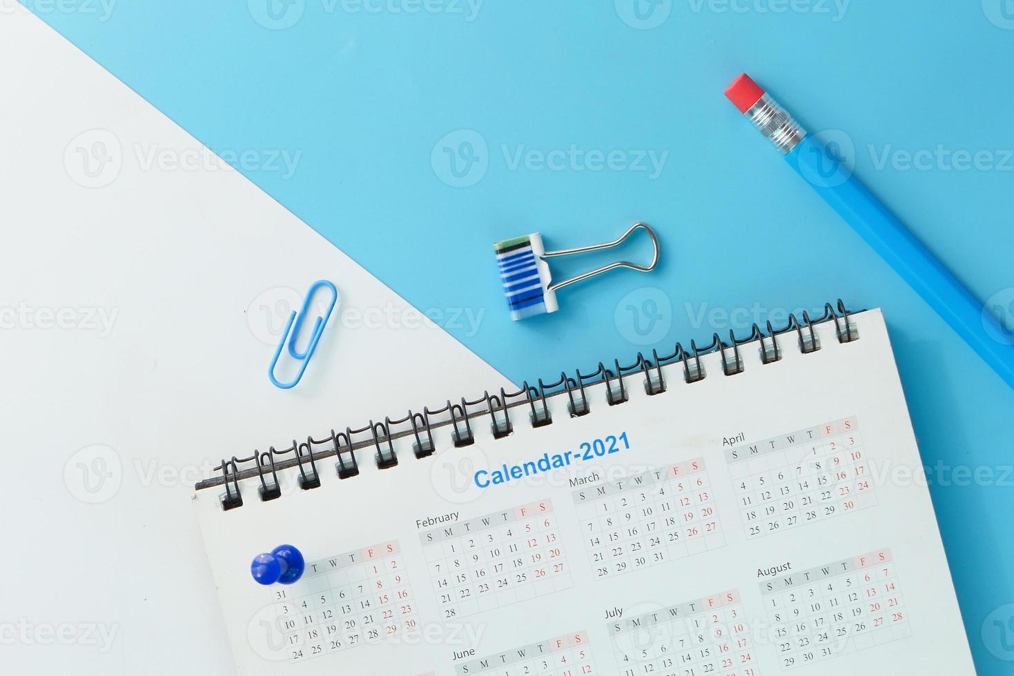 2021 calendar on blue background photo