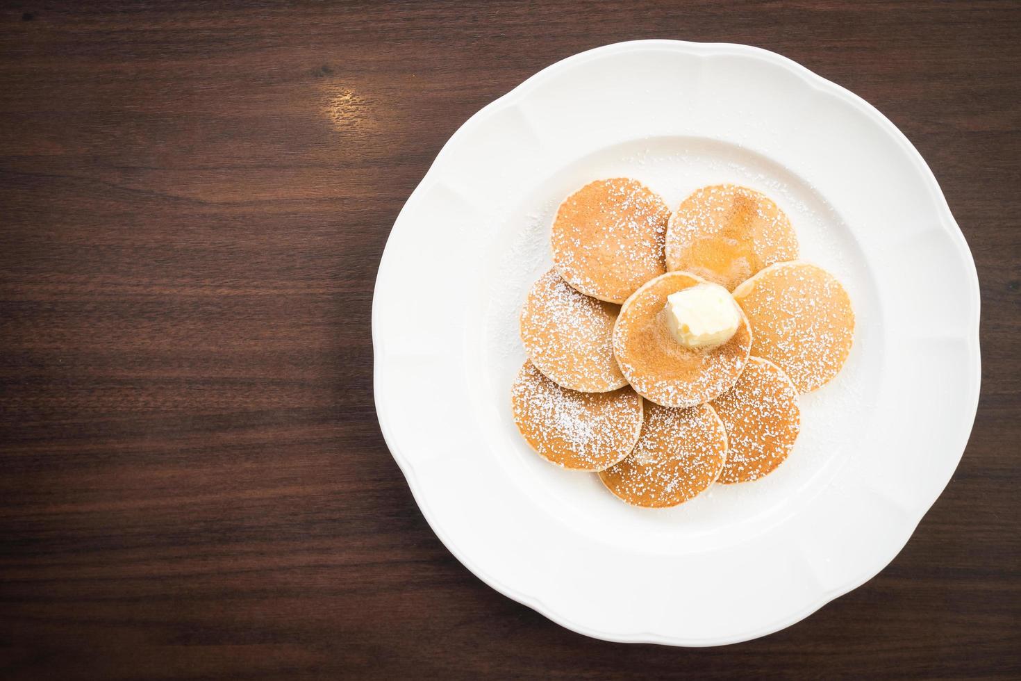 Pancake with butter on top photo