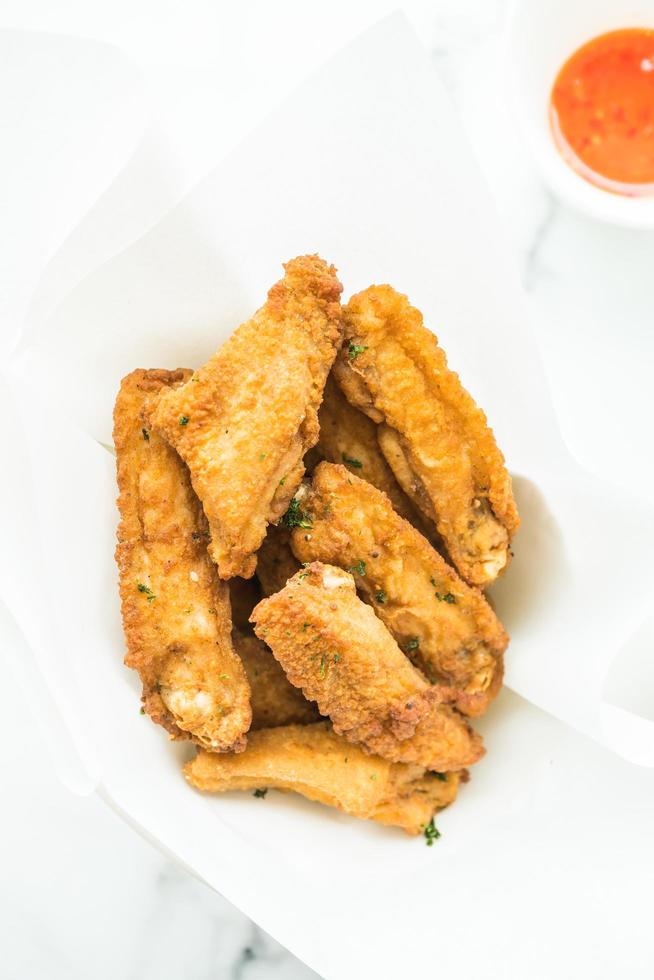 Fried crispy chicken wing photo