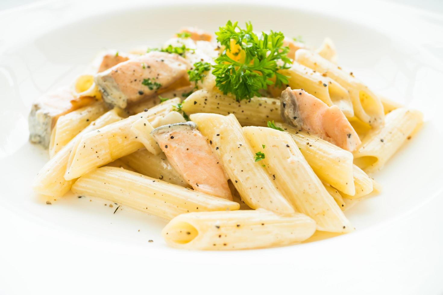 Penne carbonara pasta with salmon photo