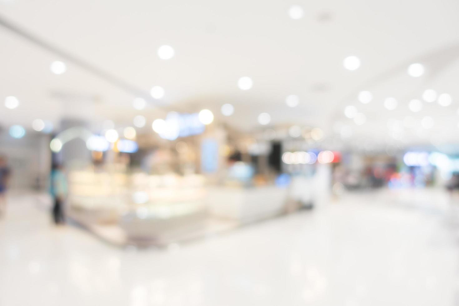 Interior del centro comercial desenfocado abstracto para el fondo foto