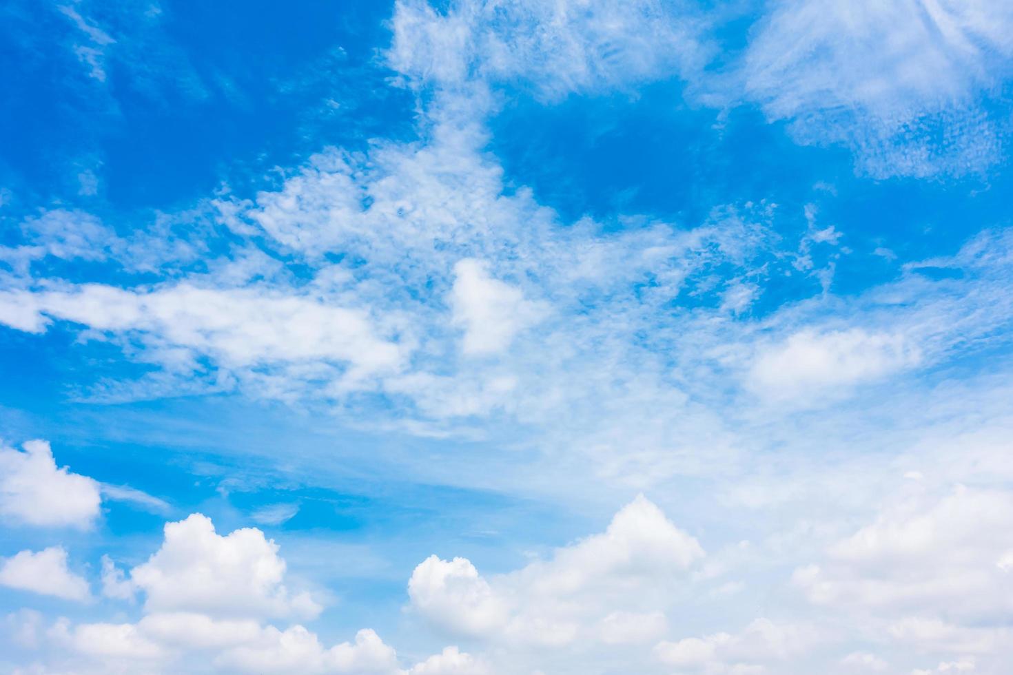 White clouds on blue sky photo
