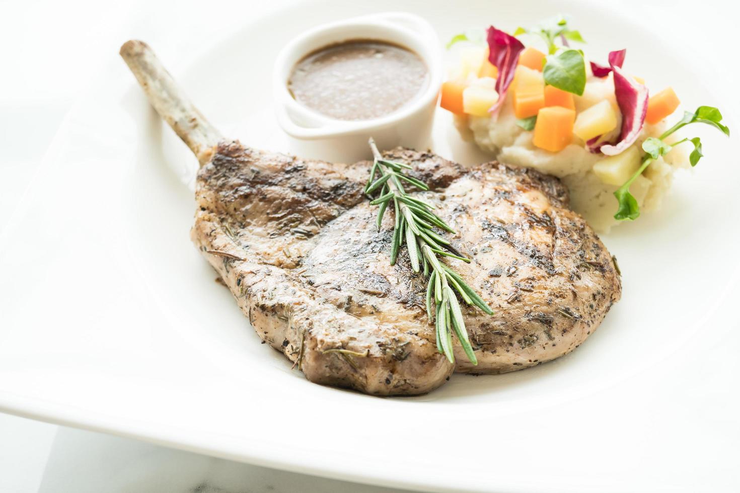 Grilled pork chop steak photo