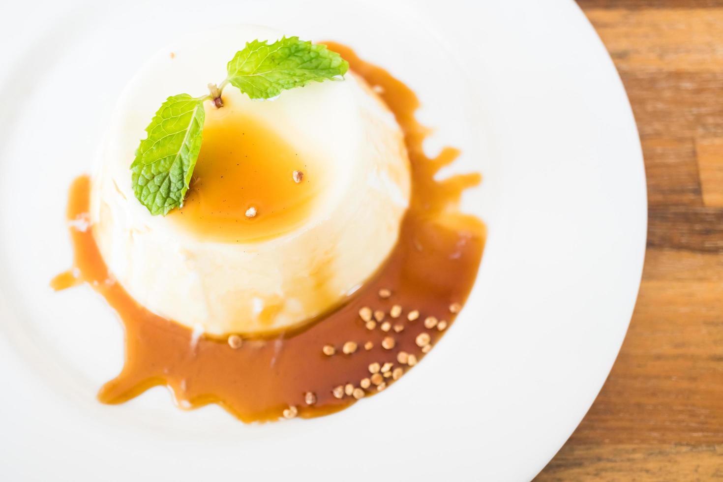 Caramel pudding and panna cotta dessert photo