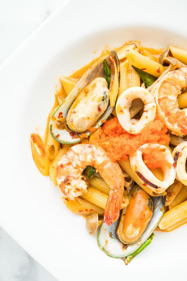 Penne seafood tom yum pasta photo