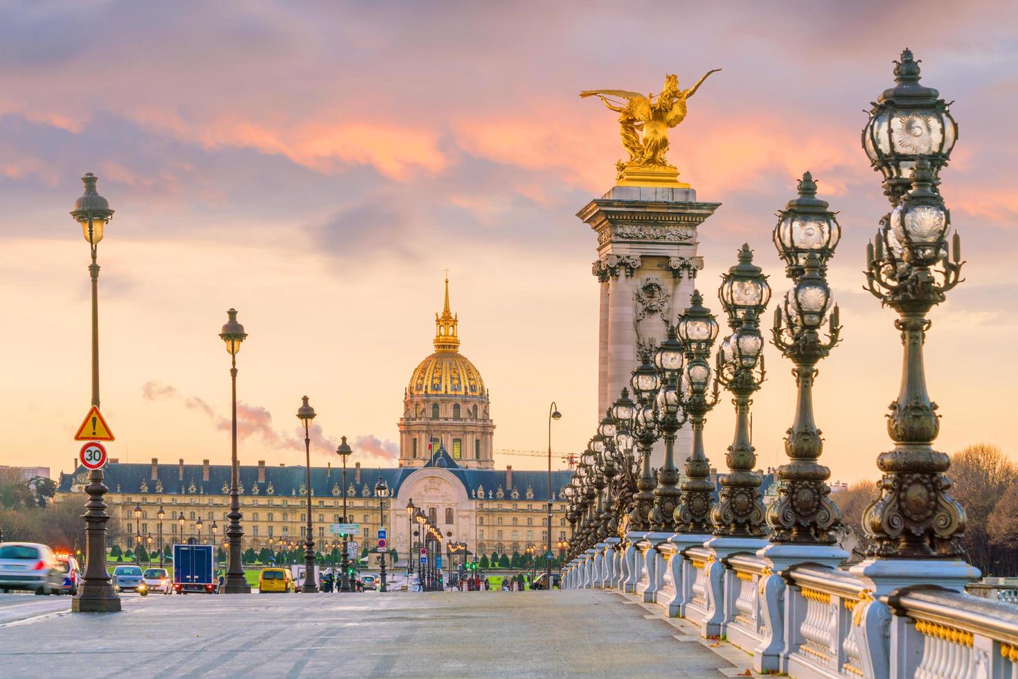 The Alexander III Bridge across Seine river in Paris photo