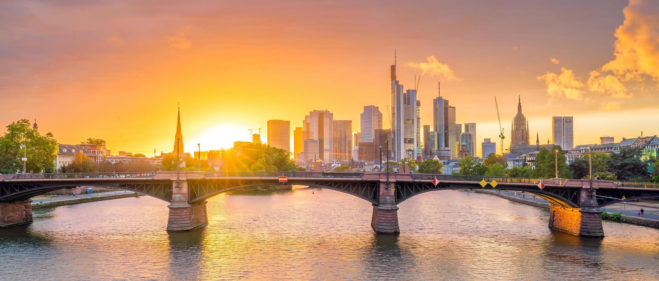 View of Frankfurt city skyline in Germany at sunset photo