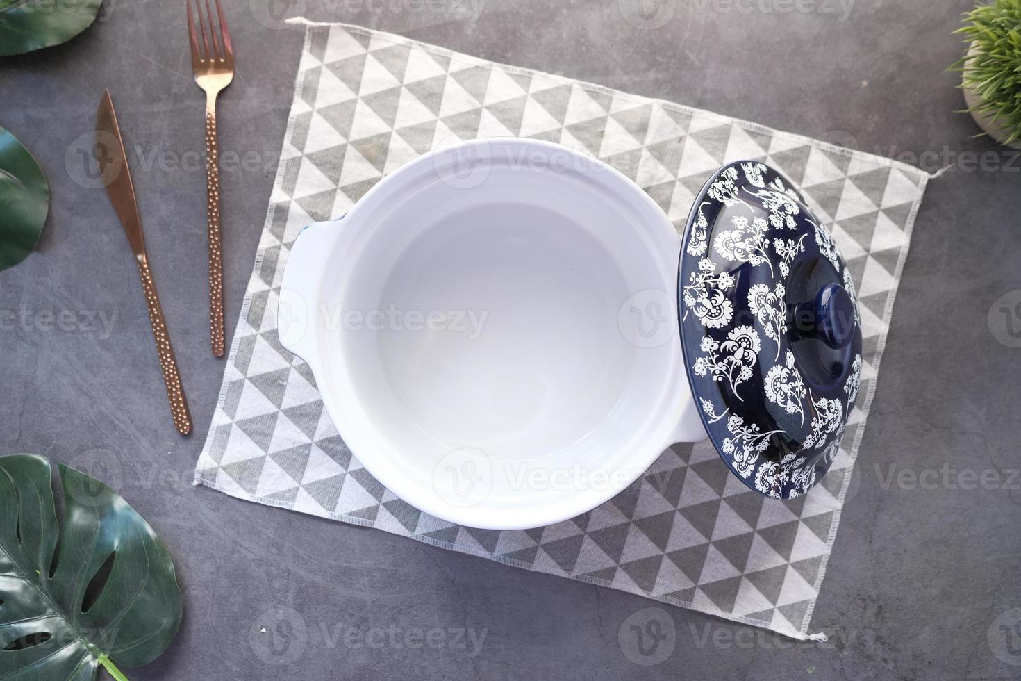 Empty bowl on a place setting photo