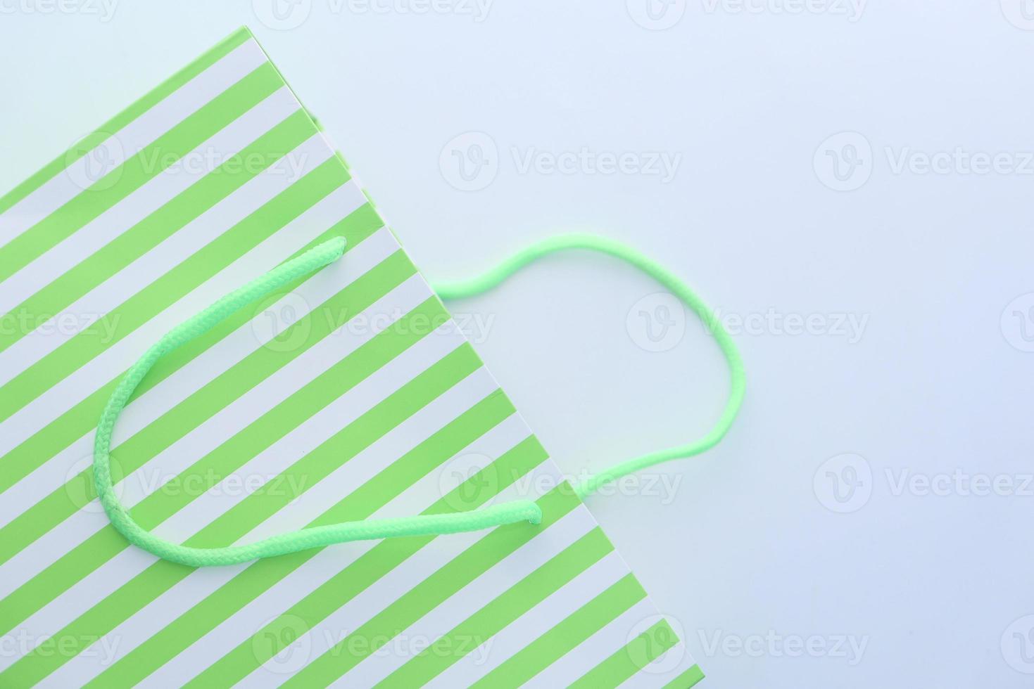 Green striped gift bag photo