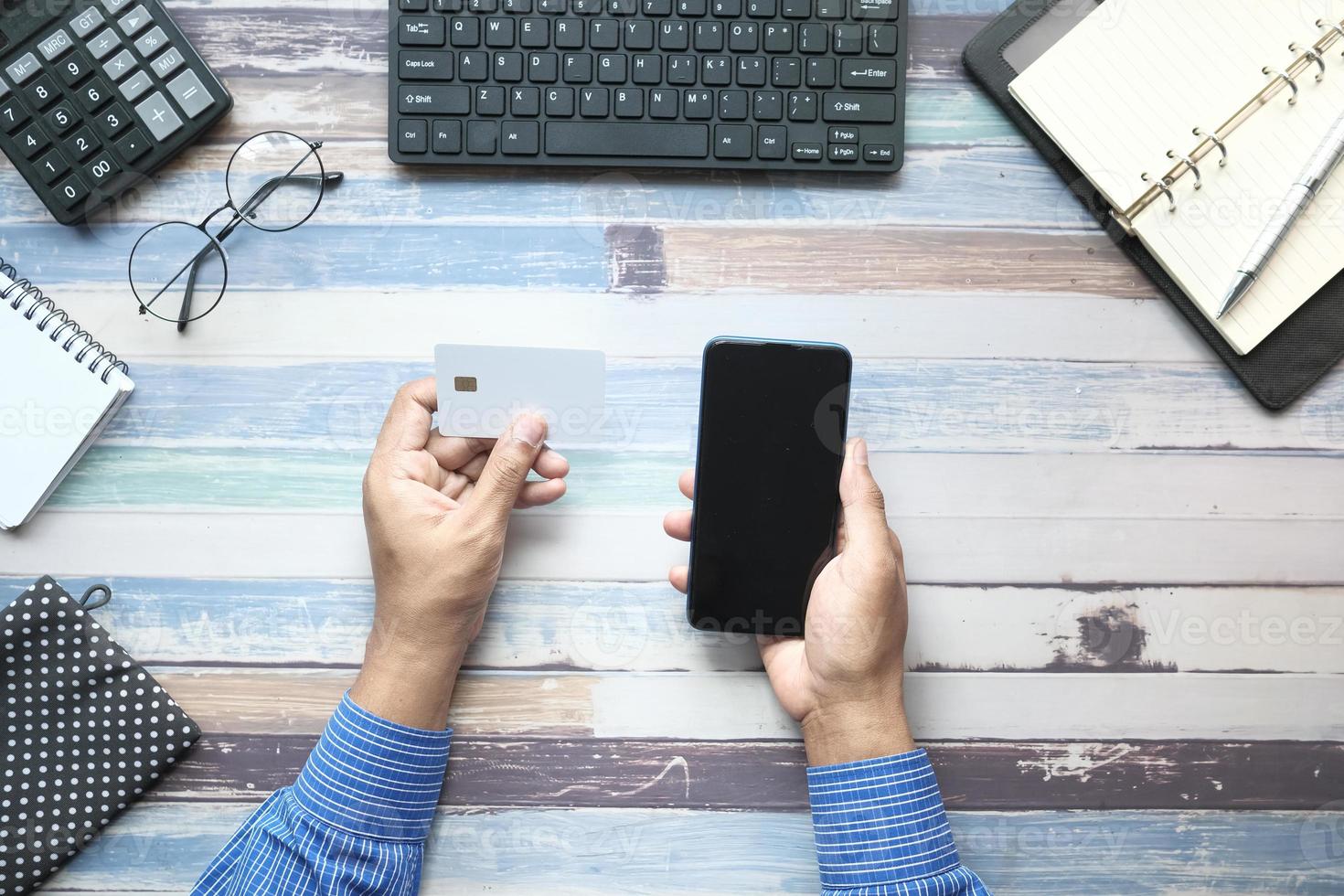 Overhead view of someone shopping online photo