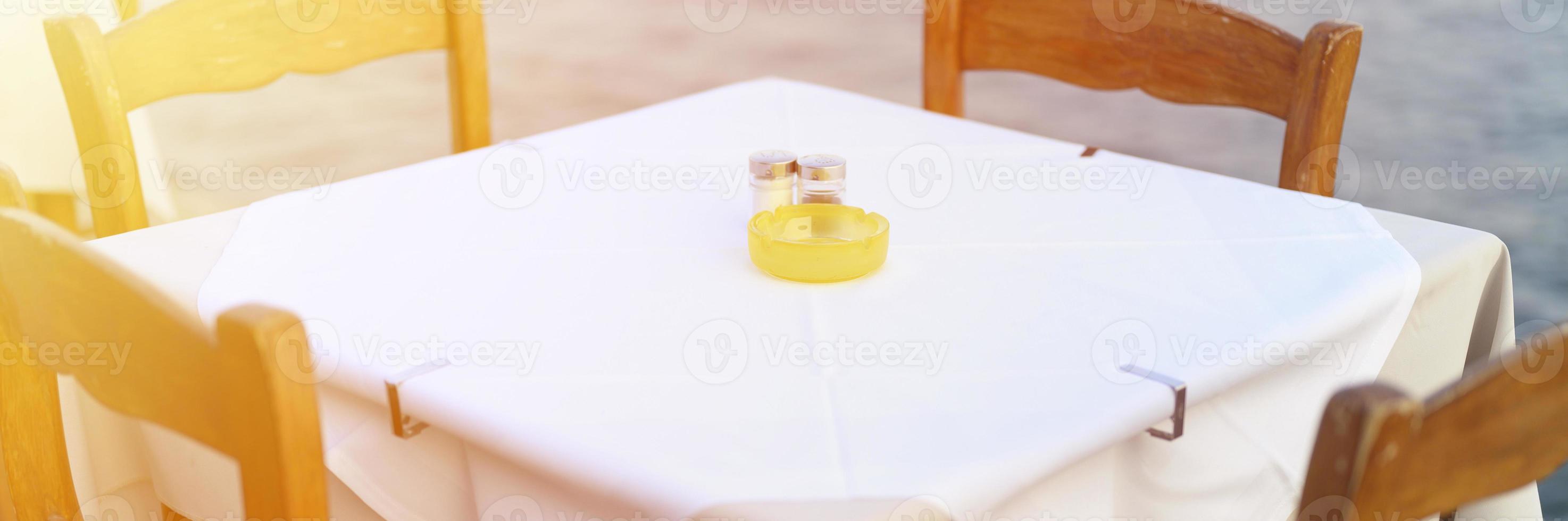 Cafe tables on the sea, selective focus photo