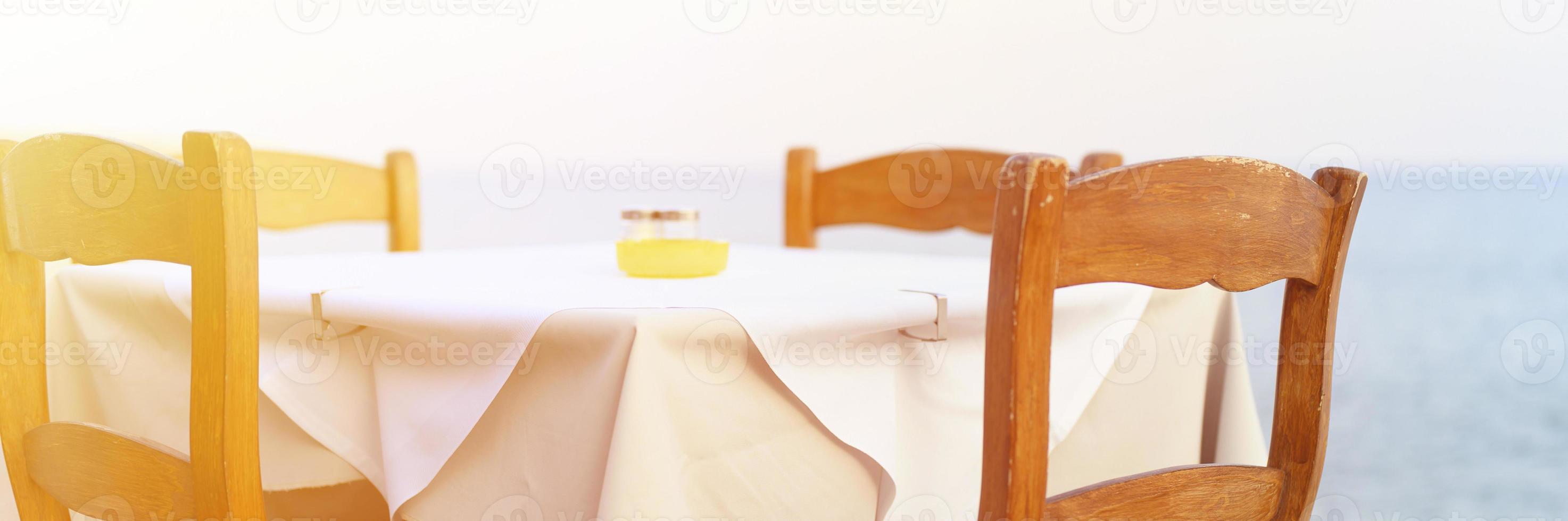 Cafe tables on the sea, selective focus photo