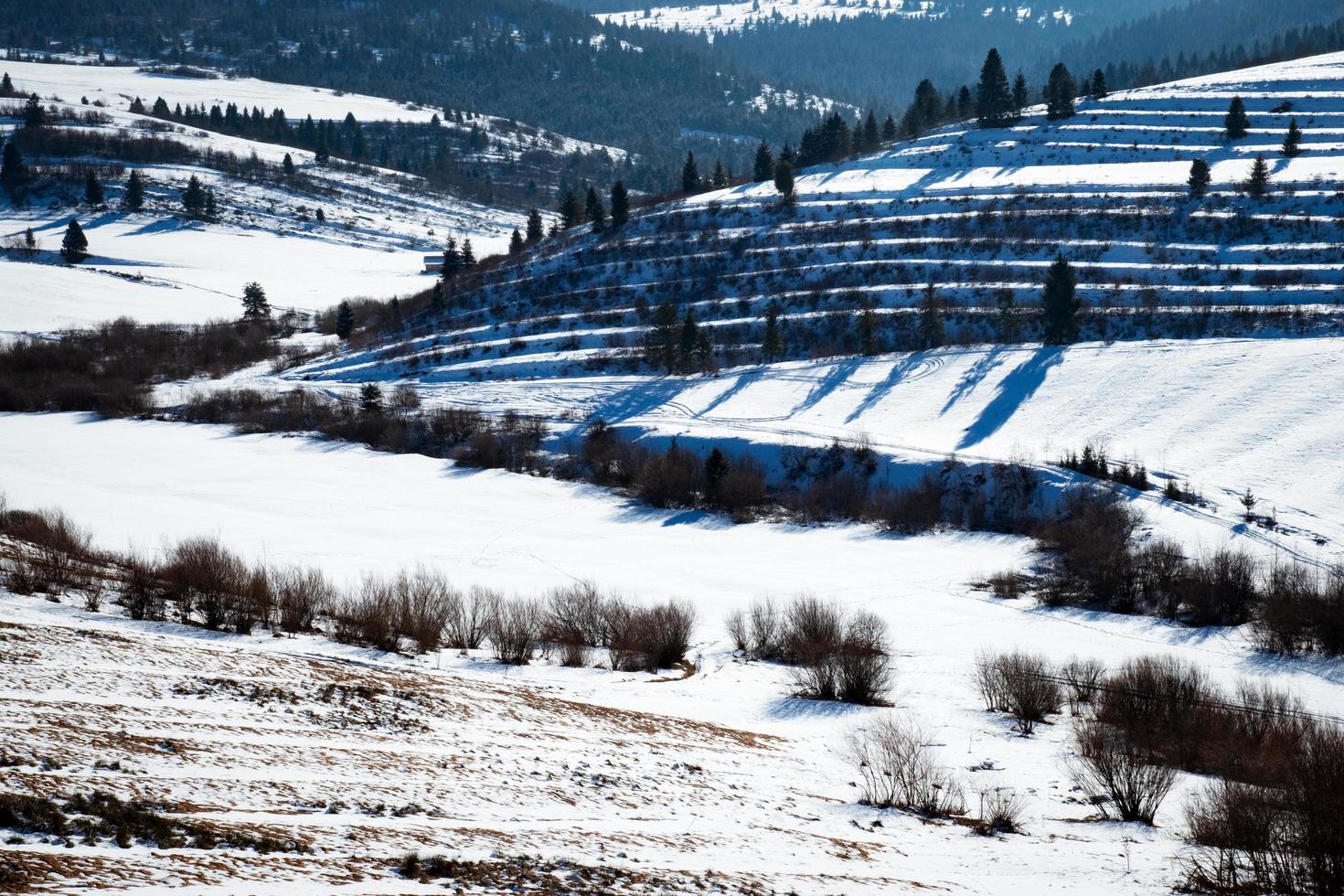 Rugged hilly winter landscape photo