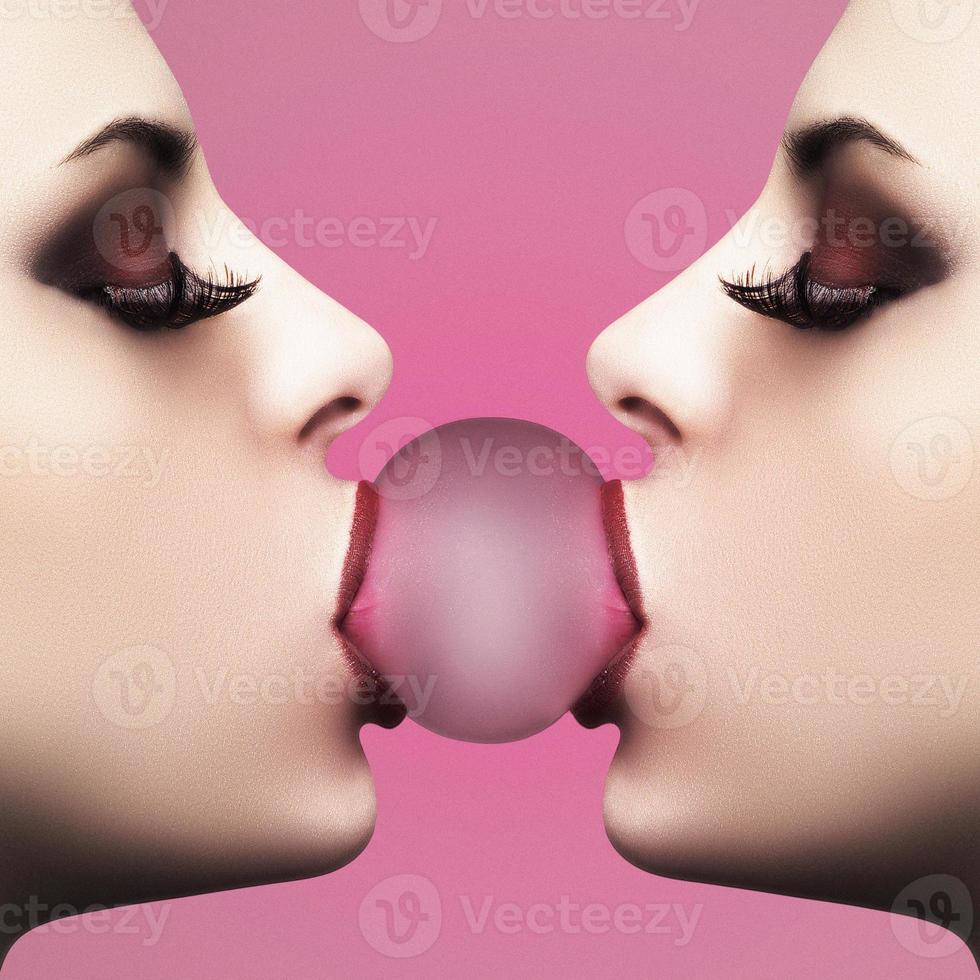 Mirrored image of a young woman with bubblegum photo