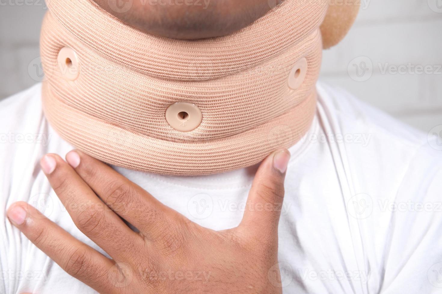 Man wearing a neck brace close up photo