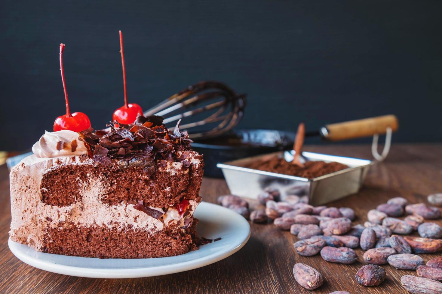 Chocolate cake with cherries photo