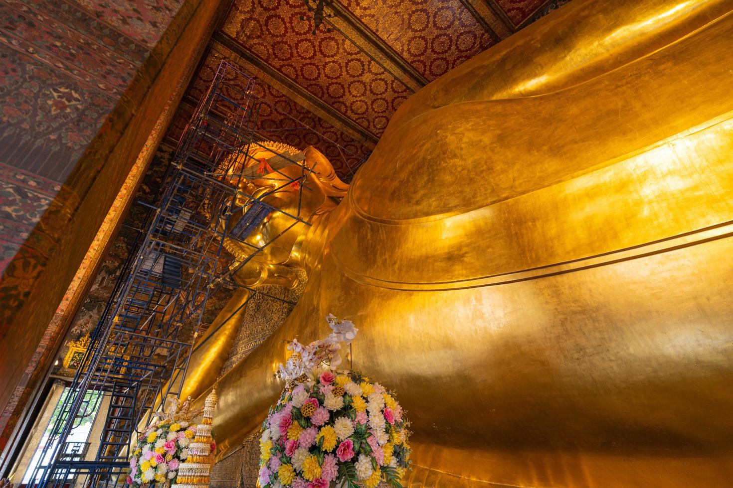 Bangkok, Thailand 2020- Inside view of the Wat Pho Golden Big buddha statue under construction photo